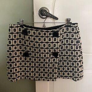 Original Milly virgin wool skirt, lined, buttons in front approx 131/2 long